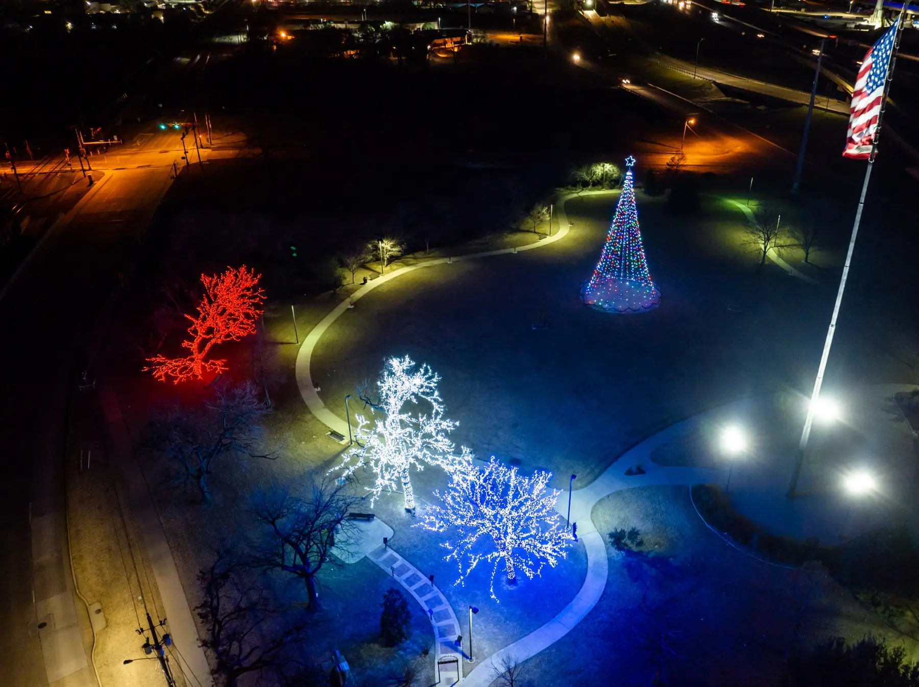 Aerial view of a large-property holiday lighting installation